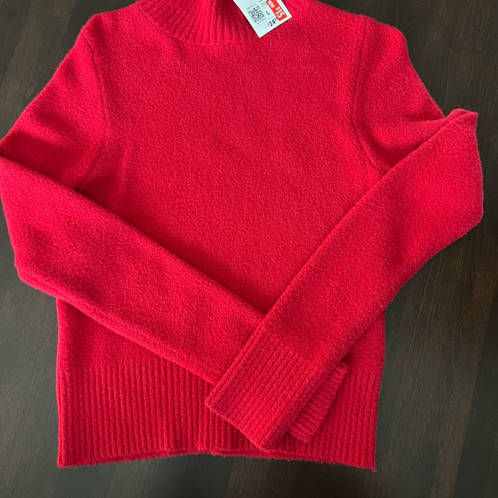 Forever 21 red soft sweater labeled large but looks like a medium to me